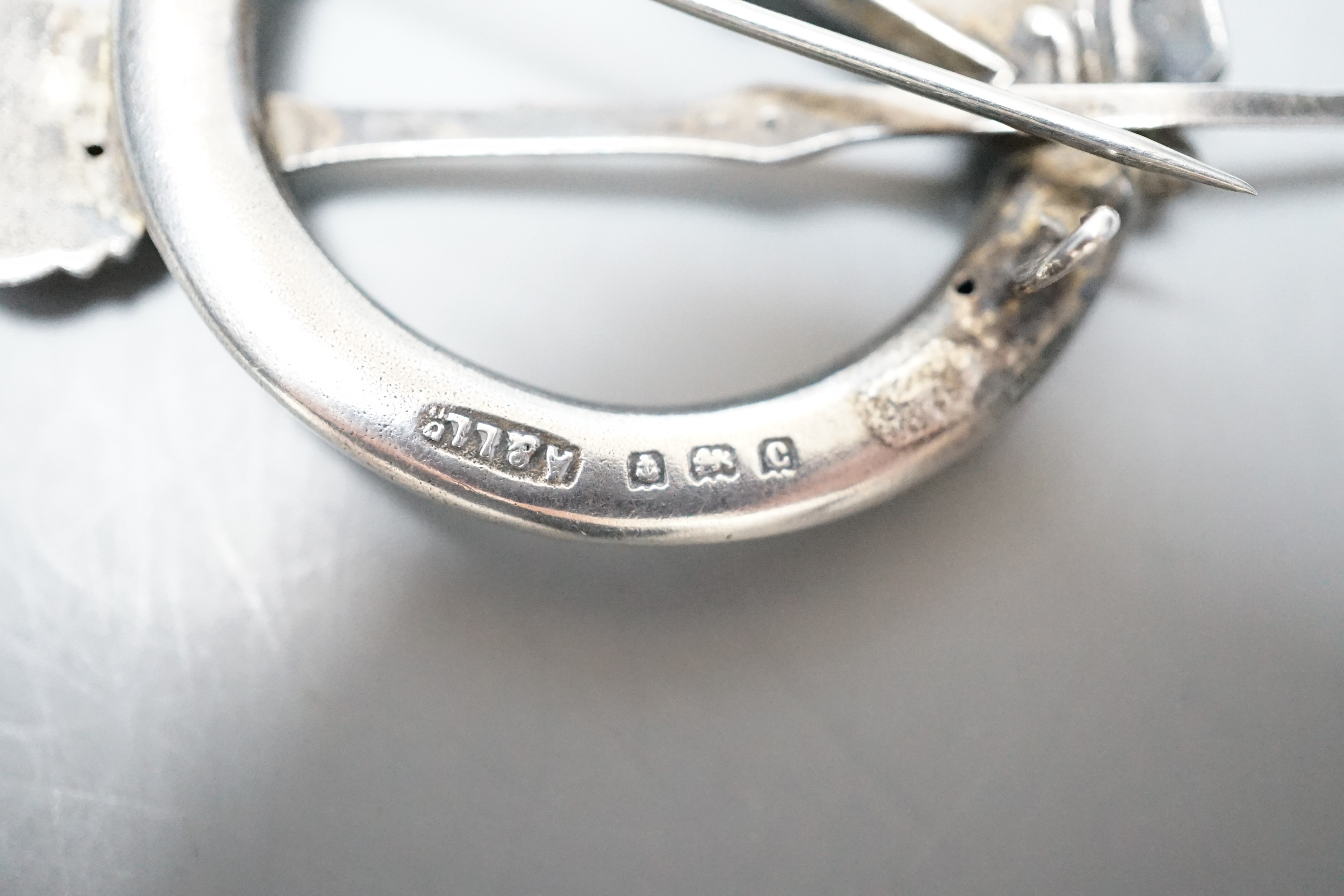 An Edwardian Celtic style silver kilt pin, Adie & Lovekin Ltd, Birmingham, 1902, 41mm.